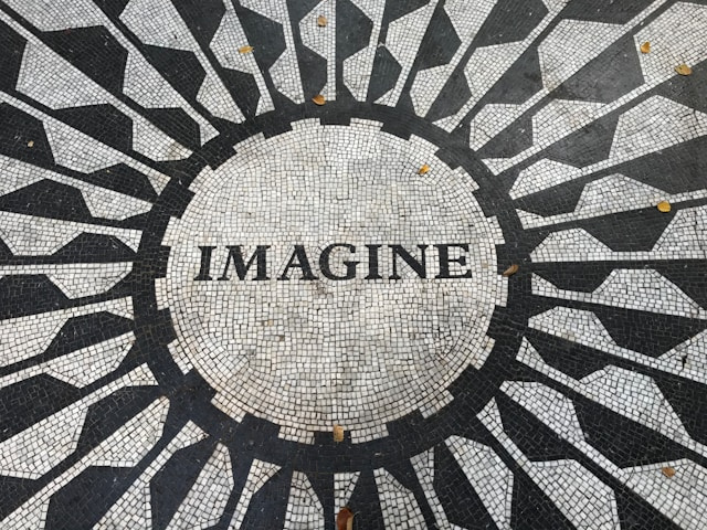 black and white tile floor with the word imagine on it to illustrate imagine your success
